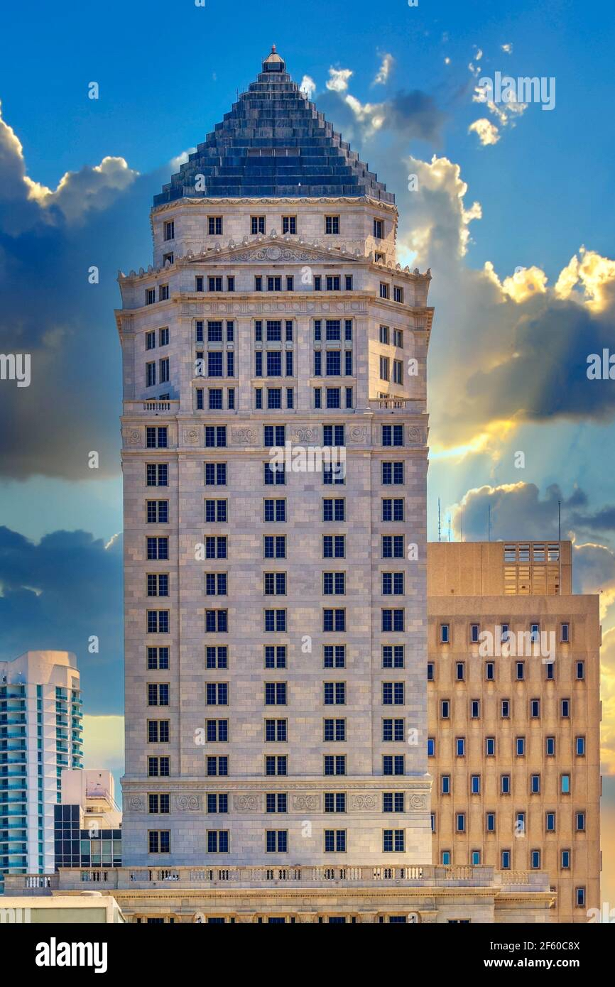 Miami-Dade County Courthouse, a tall building with a pyramid-shaped roof and decorative facade.